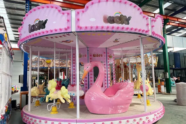 16-местная карусель Pink Swan - подробное фото 1 | JH Amusement