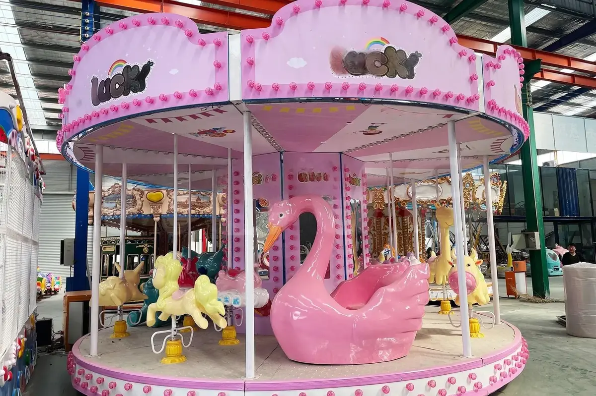 16-местная карусель Pink Swan - подробное фото 1 | JH Amusement