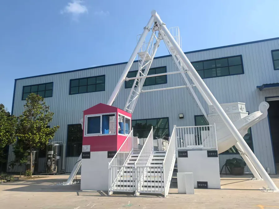 White pirate ship truss structure with pink operator cabin in pre-paint assembly